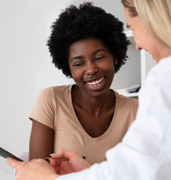 Patient taking a trigger test with a pharmacist to assess triggering COPD or asthma allergens and irritants.